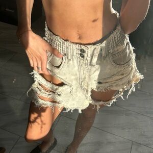 Acid washed distressed denim skirt